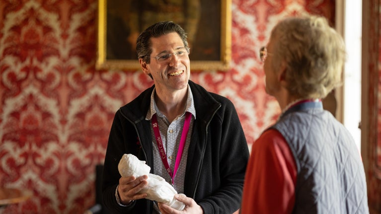 House Experience Volunteers at work in the Ambassador Room at Croft Castle, Herefordshire